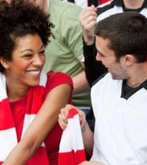 boy and girl at football match