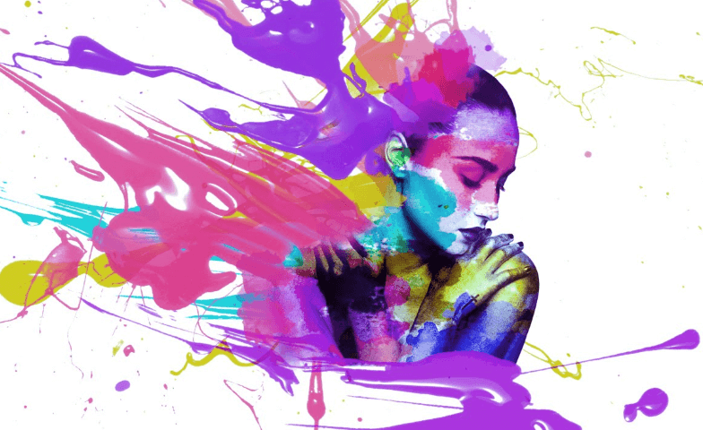 A girl who is painted with many colors